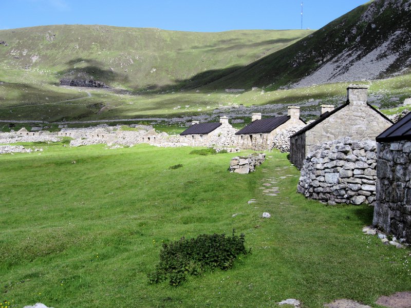 The old houses are between the new